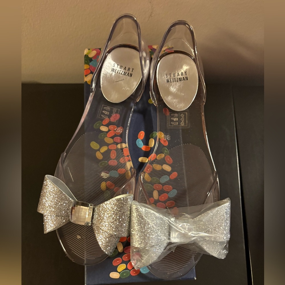 Brand New in Box Stuart Weitzman Gemini Clear Jelly Sandal with Silver Bow.